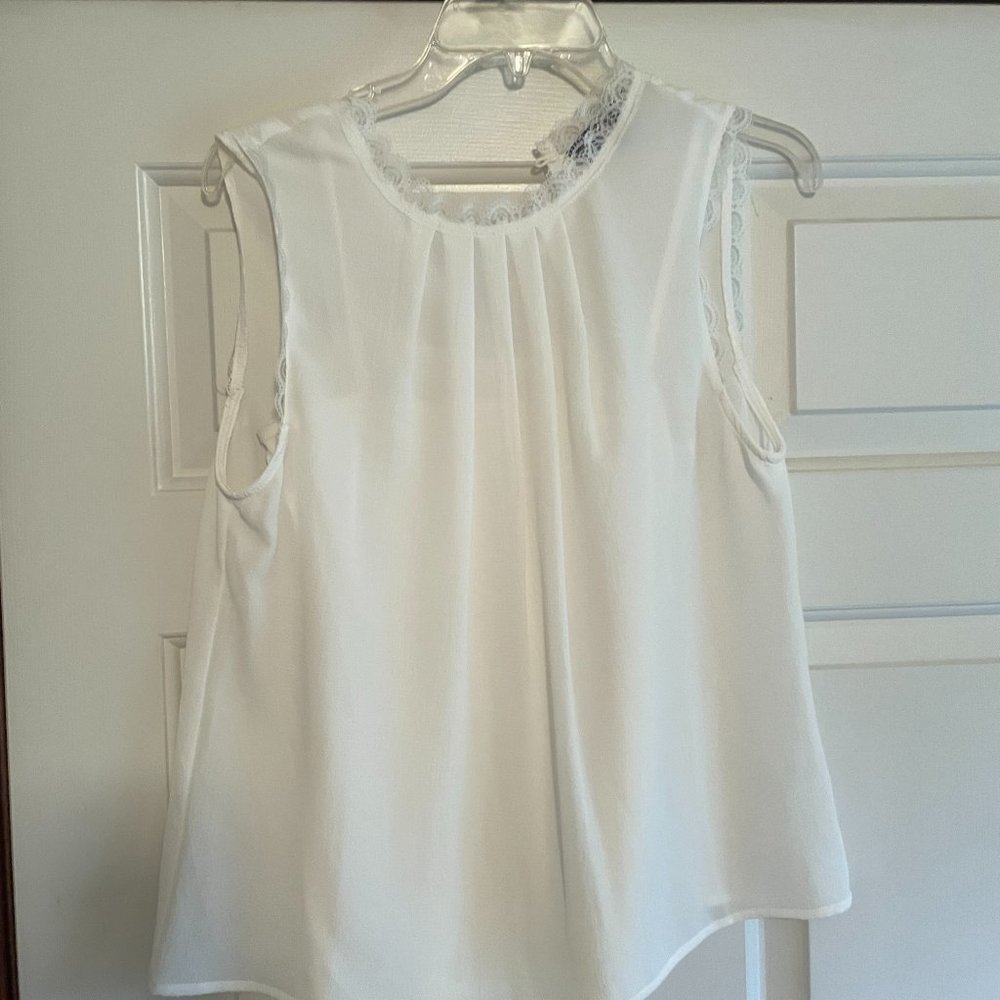 Sleeveless white top